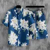 Casual shirts voor heren de nieuwe ins populaire strandhemd pakken korte mouwen shirts en trekkoord shorts Hawaiiaanse print bloemenheren kleding reizen een 240409