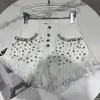 Y079 Summer New Cool Big Grein Water Water Diamond craved Greated Fringe Edge Denim Shorts para mulheres