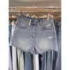 Shorts di denim blu per estate femminile 2024 Nuovo design versatile sciolto e dimagrante con pantaloni caldi a gamba larga a una linea patchwork