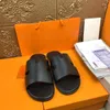 Мужские ползунки Summer Tazz Slippers Женские дизайнерские дизайнерские сандаловые роскошные плоские каблуки шлепанцы кожа