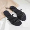 Home Oran Paris Slippers L schoenen Rubberen slippers zwembad 2024 Zomer lage hiel uit flats varkensneus ketting open teen sandalen