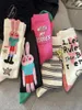 Chaussettes féminines 5 Double dopamine pour femmes hivernales coréenne Version de la bande dessinée en sentant le vent au milieu du tube