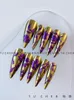 Purple and gold nail art, wearing armor, hand drawn charm, Chinese style flowers, handcrafted and stylish New Year