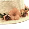 Sombreros de borde anchos sombreros de cubo simple parent-hijo verano nuevo sombrero de sol para mujer gorra beige beige bowknot flores cinta plana gorro de paja gorra de playa Panamá Y240409