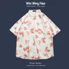 Mäns avslappnade skjortor 2024 Summer Floral Blus Short Sleeved Loose Korean skjorta för pojkar och pojkar rufsade och stiliga topp Hawaii -semesterskjorta 2449