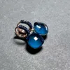 Bengelen oorbellen 12,6 mm platte nudo inleg blauw zirkoon met zwart pistool vergulde candy crystal mode sieraden cadeau voor vrouwen