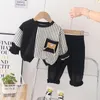 Set di abbigliamento 2024 Autunno designer bambina e vestiti da ragazzo da 1 a 2 anni fumetti casual t-shirt a maniche lunghe pantaloni per bambini