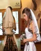 2016 Trendy Short Bridal Véils Tulle Made Made do cotovelo Comprimento exclusivo Camo Véus de casamento para Bride Spring Style Bridal Acessórios 6570840