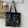 Bola de sacolas de lona para mulheres compradores de sacola de gato fofo com zíper desenho de estilo japonês desenho pequeno ombro pequeno 240401