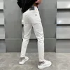 Jeans masculin rose d'été mince luxe luxueux à la mode entièrement stimulant slim skinny pantalon serré couleur