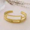 Bracciale da donna Bracciale Instagram Style Fine Titanium Acciaio 18K Oro Oro DOT a onda circolare Open Simple squisito