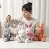 30cm Cartoon Simulation mignonne Bow lapin en peluche poupée jouet enfants sommeil apaisant les jouets décorations de chambre cadeaux d'anniversaire 240401