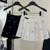 Designer -Rock Frauen Röcke Mode Sommerbrief Stickerei Kurzkleid schwere Strass und Freizeit -Faltenrock