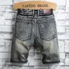 Brand mass retro estilo rasgado shorts jeans 2023 Moda de verão Casual Hole Patch Jean Male Roupos 240328