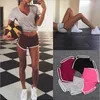 Women Sports Shorts a strisce casualmente pantaloni da yoga a colori solidi