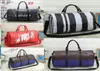 Stor kapacitet duffle påse resväskor utomhus läder polyester vanlig tryck handväskor ränder bokstav mjuk bagage ryggsäckar flickor b5943664
