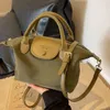 2024 Début de printemps Nouveau crossbody Sac de bouletage pour femmes sac de téléphone mobile nylon léger et sac à main polyvalent longxiang sac