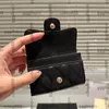 Designer feminino Black Classic Mini Flap Solded Lampskin Caviar Card de couro Tiny Bags Bolsa de Luza de Mertilha de Diamante 8cm