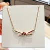 High Version V-gold T-family Pink Diamond Twisted Necklace for Women's Gold Light Series Knot Cross Collarbone Chain Trend