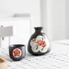 Keramikweinset Drinkwarenware Japanisch kreative Unterglasfarbe rotes Pflaumen Geschenkbox Haushalt 1 Topf 2 Tassen Sake Likör Waterware