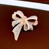 Illusionary Diamond Studded Pearl Bow Brooch with High-end Feel, Sweet Temperament, A Small and Versatile Design Feel Accessory