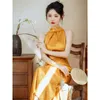 Ethnische Kleidung 2024 Frauen chinesisches Kleid Qipao Cheongsam verbesserte ärmellose gelb hängende Hals modern