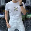 New 2024 Mens mulheres famosas marcas designer t camisetas de moda Mank Man T-shirt Top Cotton Cotton Italy Tees casuais