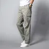 Pantaloni da uomo primaverile autunno alto con tasche solide con cerniera elastica ricamo di giunzione elastico pantaloni per gamba dritta casual