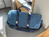 Lüks çantalar erkek duffel çantaları denim mektup keepall 40 45 50 çanta tasarımcısı marka omuz çantaları çiftler bagaj kılıfları havaalanı seyahat çantası kadın spor salonu fitness çantaları