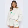 Designer White Women Suisses de tracks deux pièces courts sets Sweins Sweins Sweins Sweet Femelle à manches courtes T-shirt Loose Sport Woman Vêtements