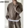 Traccetti da uomo Umi Mao Dark Top Giacca