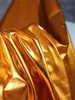 TPUコーティングストレッチファブリックスパンデックス光沢のあるゴールデンディーバックグラウンド装飾水着タイツレギンススカートメタリックデザイナーファブリック