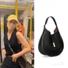 Een niche -ontwerp met een grote capaciteit Crossbody onderarm koehide song tas polo nummer yanfei zheng xiujing dezelfde tas