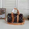 Pochette Voyage Souple Souple Discovery Weistpack Designer Bag حقيبة يدوية الحليب الشوكولاتة الرسوم المتحركة على طراز حقيبة جلدية غير رسمية حقيبة الكتف