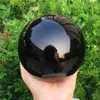 Grande sphère d'obsidienne noire naturelle grande pierre de guérison de la boule de cristal