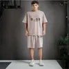Herrspårsperioder Kortärmad kostym Summer Brand Fashion Waffle Casual T-shirt och Shorts 2-stycke Basketball Sports Fitness Sportwear
