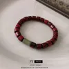 Nieuwe Chinese stijl sandelhoutcilinder bamboe knoop jade elastische armband china-chic niche ontwerp string licht mode hand sieraden