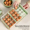 Förvaringsflaskor ägg dispenser hängande köksarrangör kylskåpslådan