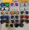 Tasarımcı Güneş Gözlüğü Kadınlar İçin Lüks Gözlükler Popüler Mektup Güneş Gözlüğü UNISEX GEGLASSES Moda Seyahat Giyim Güneş Gözlükleri Kutu Goggle UV Koruma Güneş Gözlüğü