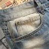 Jeans pour hommes en détresse en détresse rétro bleu mode mince pantalon de moto