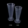 Cup de mesure en plastique 50 ml / 100 ml Puche pour le bec de surface des outils de cuisine accessoires de cuisine