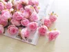 100pcs/embalagem flores artificiais cabeças de chá de chá de rosa de seda