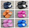 Designer classici sandali bambini bambini chiodi blu rosa ragazze con fibbie pancella di cornice cornelli per bambini neonati bianchi impermeabili di scarpe da spiaggia all'aperto 1225799