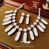 Diamond Eingelegtes ovales Quasten -Ohrring -Set, leichte, modische und einfache Temperamentkettenkettenketten, neue personalisierte Halskette für Frauen