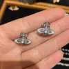 Designer Viviane Westwood High Version of Empress Dowager Saturns Milky Blue Surrounding Planet Full of Diamond Earrings for Women Light Luxury and Sweet Pentagon P