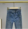 Frauen Jeans Damen hohe Taille schlafe geschlitzte Frauen Perlen -Strass -Flare -Hosen dünne elastische Denimhose Frühling Herbst