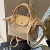 2024 Début de printemps Nouveau crossbody Sac de bouletage pour femmes sac de téléphone mobile nylon léger et sac à main polyvalent longxiang sac