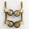 4pcs Brass + полиуретан универсальная мебельная кейстера Стол Стул Диван колеса колеса мебель бегуны ролики с винтовым стержнем Z529