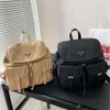 Handväska designer 50% rabatt på heta varumärkesväskor familj ny ryggsäck nylon mode mångsidig stor kapacitet avslappnad liten kvinnors väska