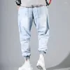 Mäns jeans koreanska mode fotled bandade denim män svart grå lastbyxor för elastisk baggy harem streetwear hiphop